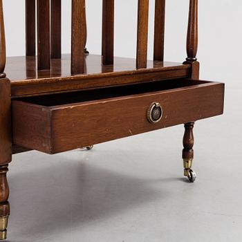 A mahogny newspaper stand (so called Canterbury), England, late 20th century.