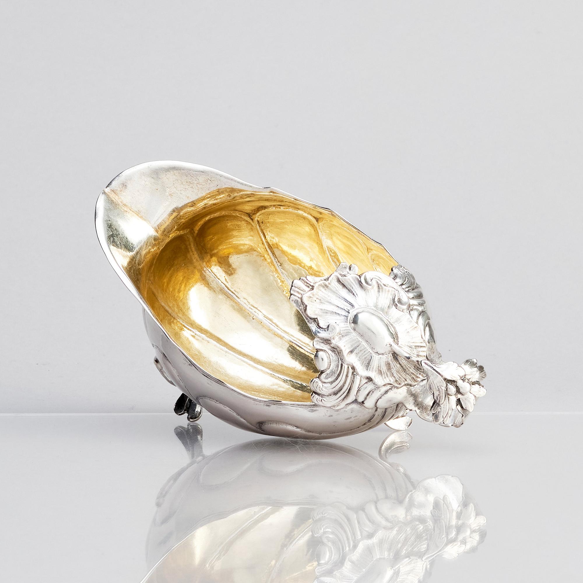 A Swedish parcel-gilt silver cream-jug, mark of Daniel Lundström, Stockholm 1764.