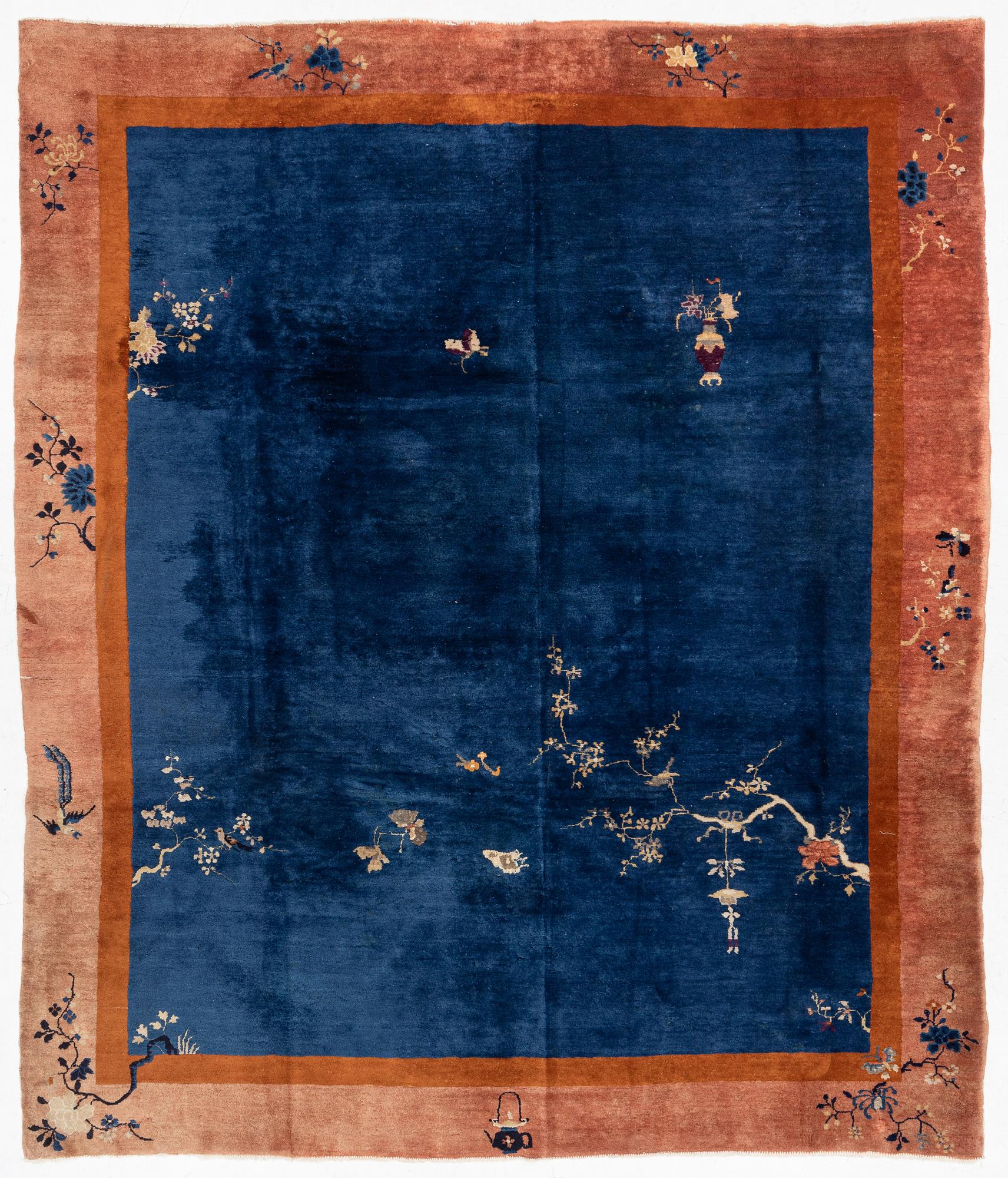 A Chinese art deco carpet, c. 327 x 278 cm.
