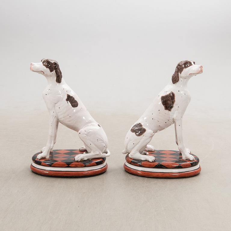 Decorative sculptures a pair England 20th century glazed ceramics.