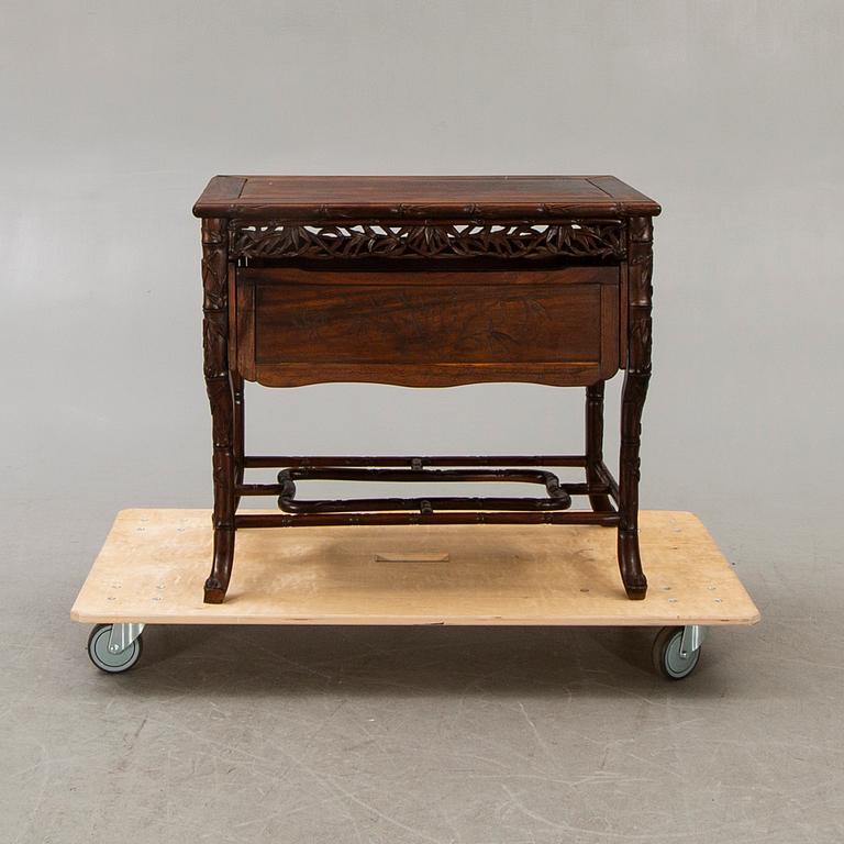 An Asian 20th century serving table.