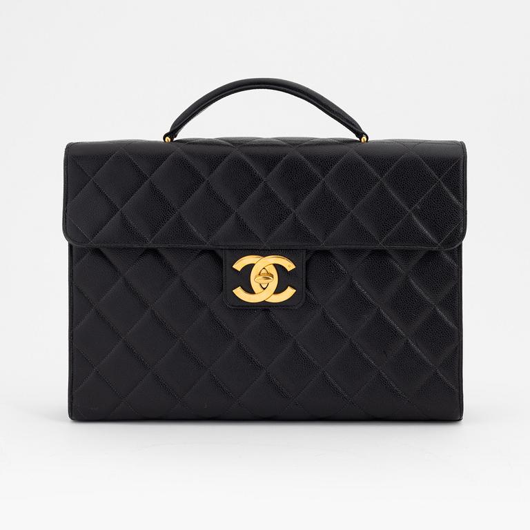 Chanel, a black caviar leather briefcase.