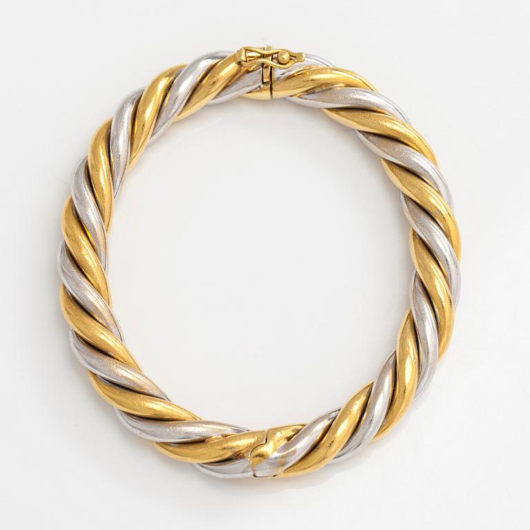 An 18K gold/white gold bracelet, Switzerland.