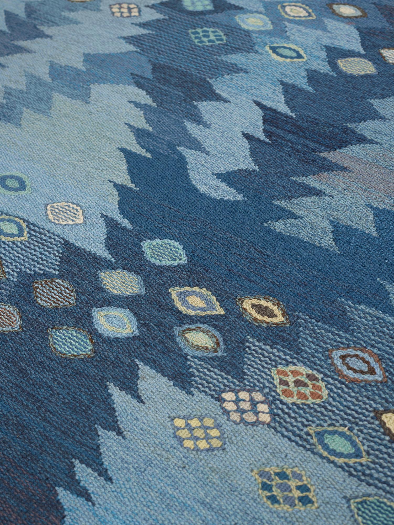 Barbro Nilsson, A carpet, "Tånga blå", flat weave, ca 355 x 252-256 cm, signed AB MMF BN.