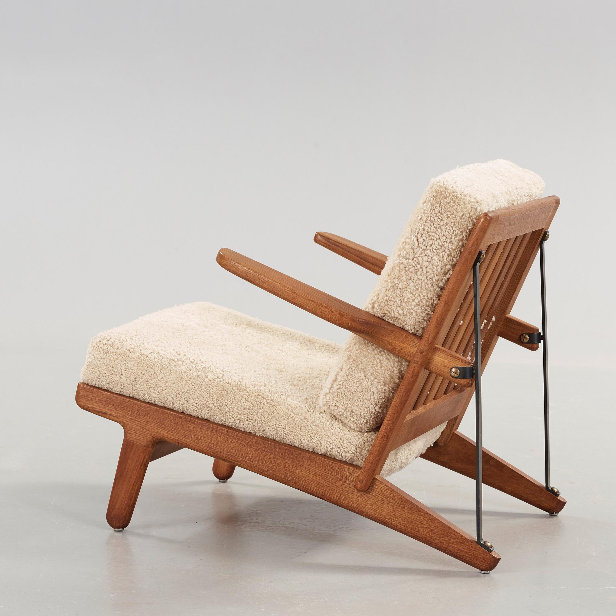 Børge Mogensen, an oak and iron easy chair, Fredericia, Denmark 1950's.
