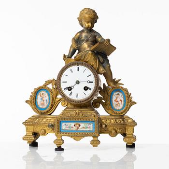 A Louis XVI-style French mantel clock, circa 1900.