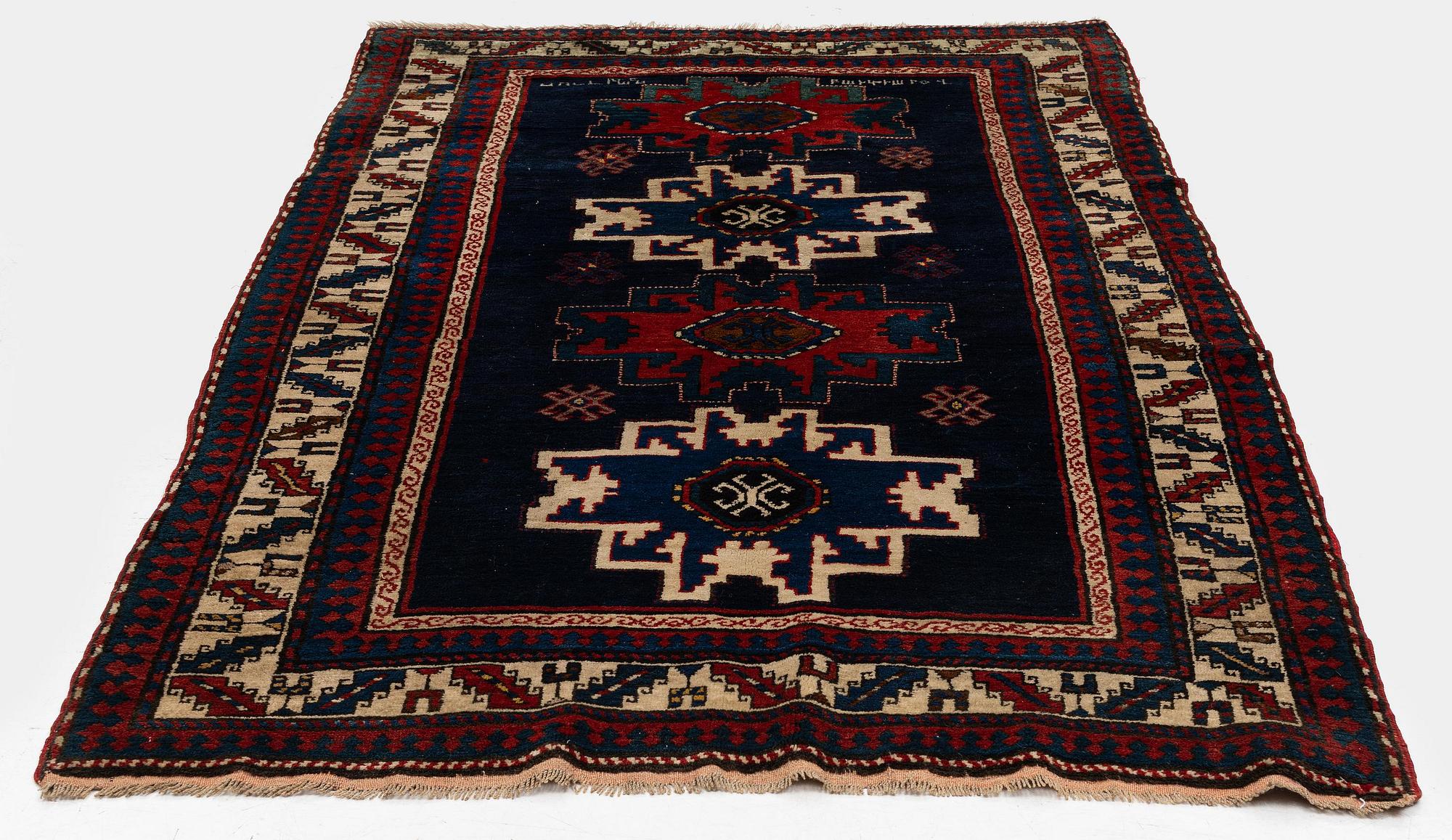 A Lesghi rug, North East Caucasus, signed, c. 230 x 135 cm.