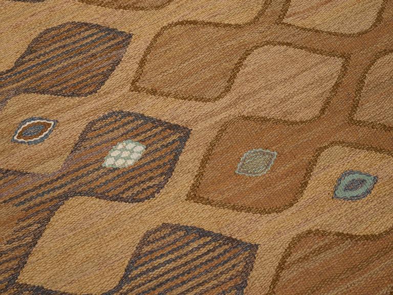 Barbro Nilsson, A carpet, "Finspong, lättbrun" ("Kringelikroka"), flat weave, ca 298 x 203-204 cm, signed AB MMF BN.