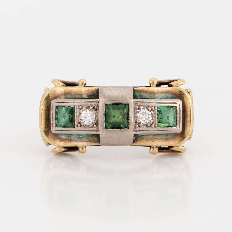 A ring with green tourmaline and brilliant-cut diamonds.