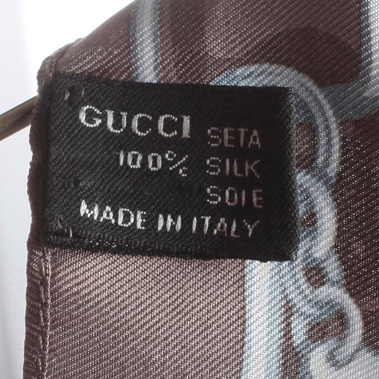 GUCCI, a grey printed silk top.