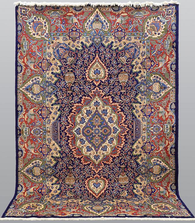 A carpet, Figural Kashmar, ca 315 x 203 cm.