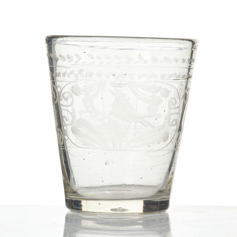 An engraved glass goblet, 18th century.