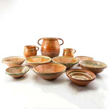 Jug, spill bowl and bowls 11 dl Skåne 20th century glazed earthenware.