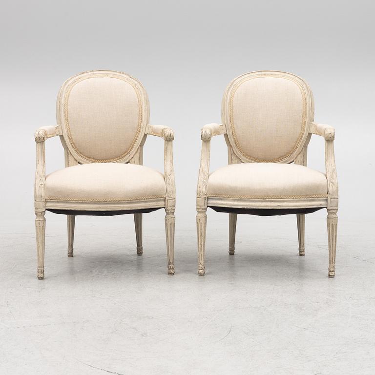 A pair of Gustavian style chairs, circa 1900.