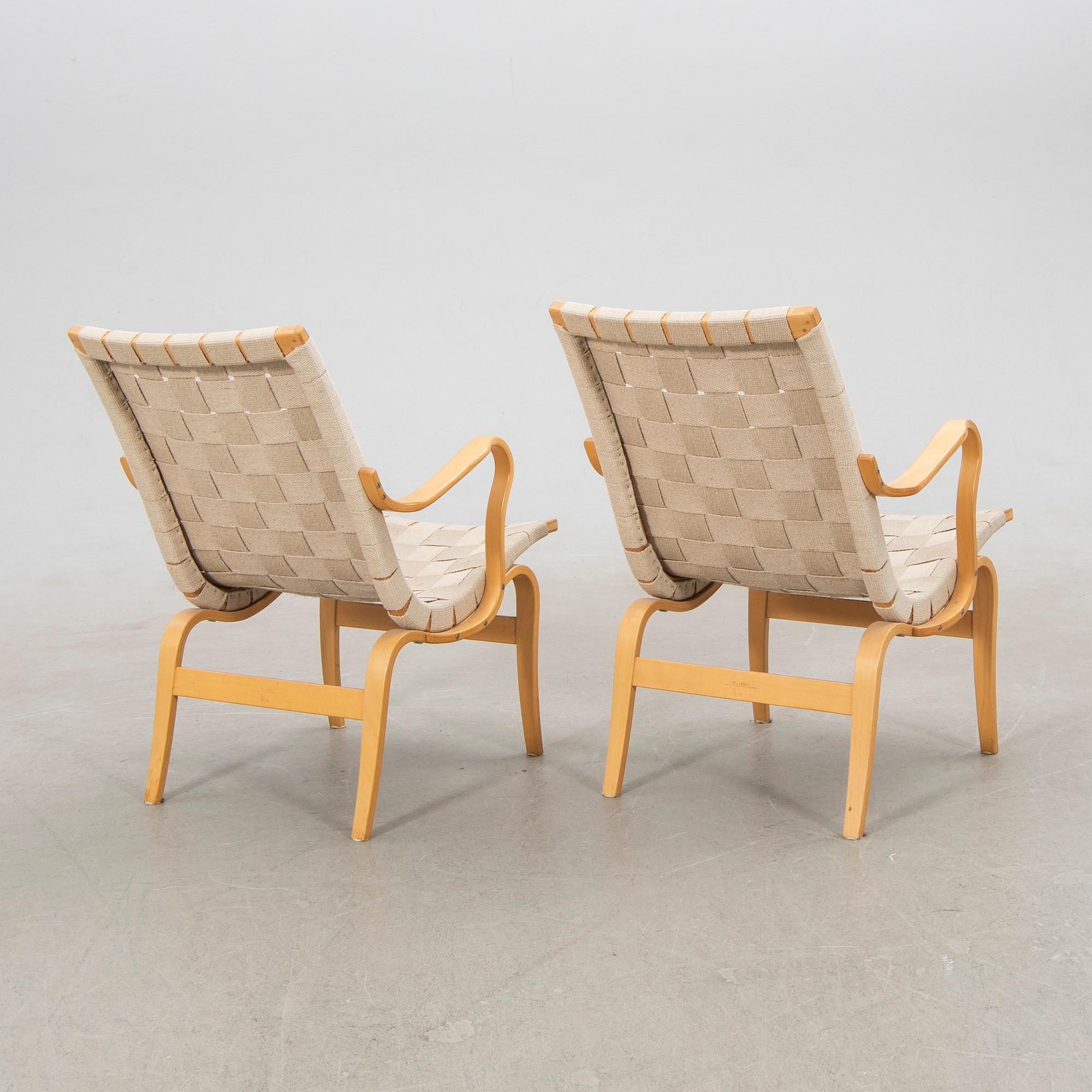 Bruno Mathsson, armchairs, a pair, "Eva", DUX, late 20th century.