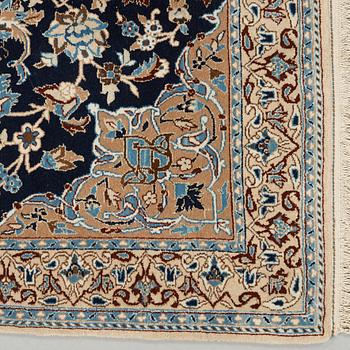 A 6 LAA Nain rug, around  119 x 77 cm.
