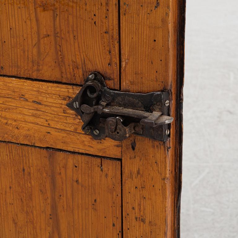 A Swedish provincial wall-hanged corner cabinet, dated 1790.