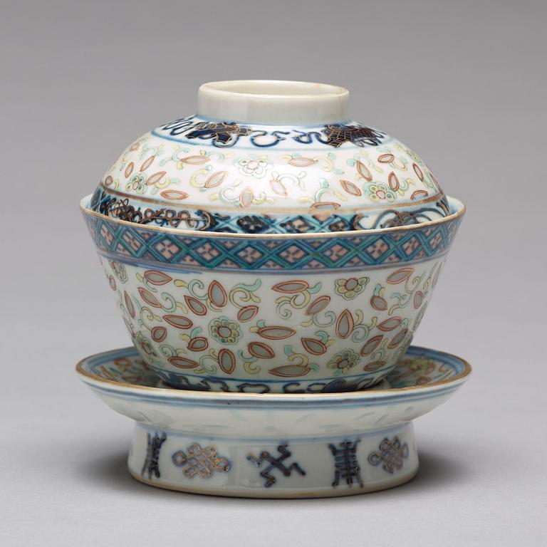 A sang de boef vase and bowl and an enamelled cup with cover and stand, Qing dynasty (1664-1912).