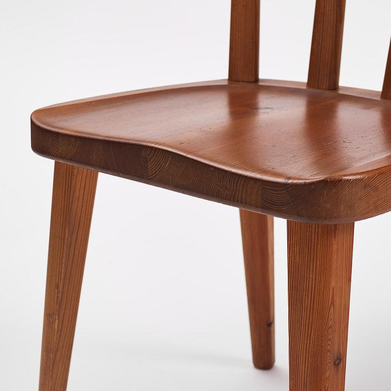 Axel Einar Hjorth, a set of four stained pine "Utö" chairs, Nordiska Kompaniet, Sweden, 1930s.