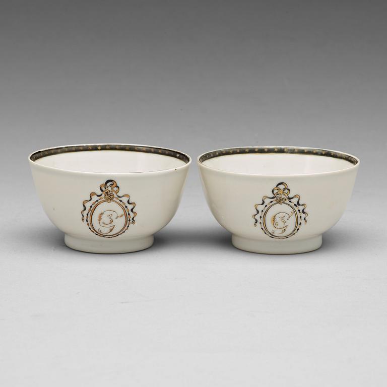 A pair of armorial grisaille cups, Qing dynasty, Qianlong (1736-95).