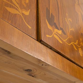 Erik Matsson, a walnut-veneered cabinet, Mjölby Intarsia, 1940's/50's.