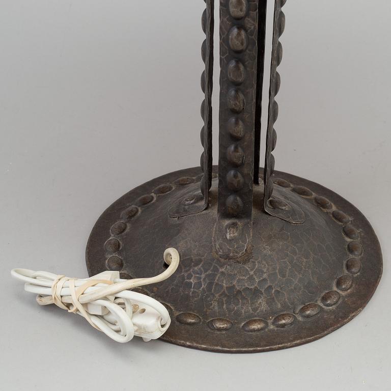 A early 20th century metal table light.