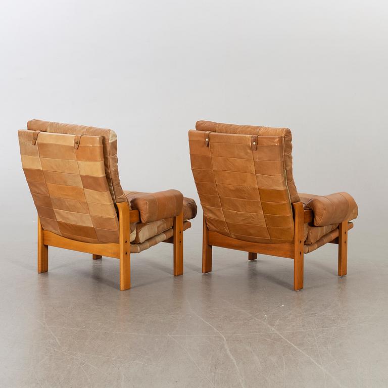 A pair of 1970's armchairs.