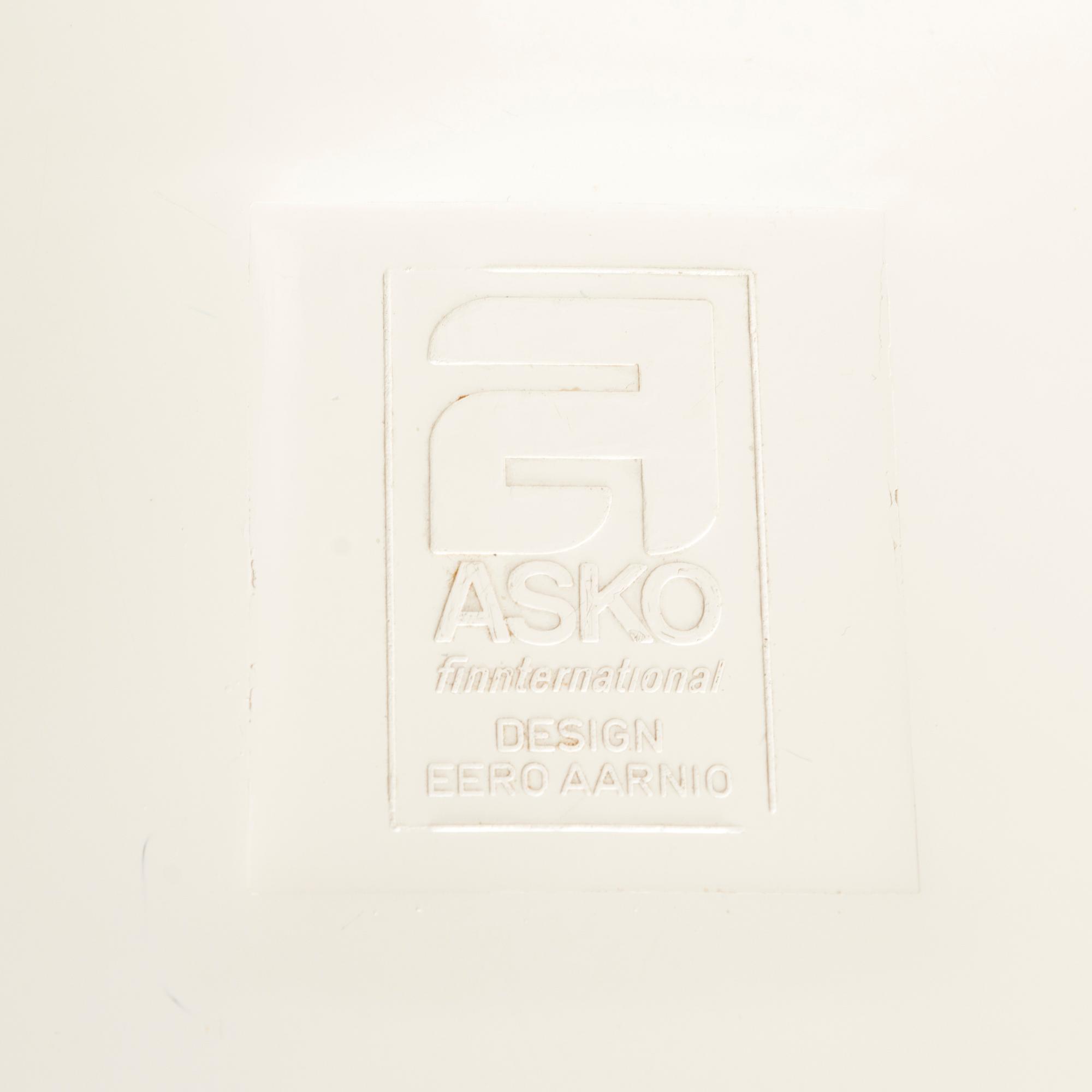 EERO AARNIO, a set of four 'Cognac' chairs by Artekno for Asko Oy.