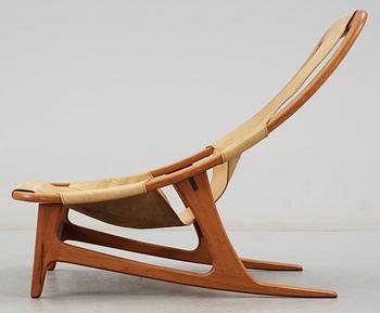 An Arne Tidemand Ruud teak and leather easy chair, by Norcraft,