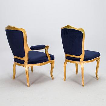 A pair of Rococo style armchairs chairs and chairs, first half of the 20th century.