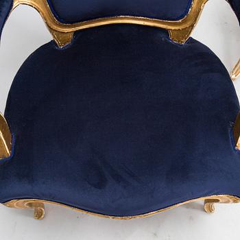 A pair of Rococo style armchairs chairs and chairs, first half of the 20th century.