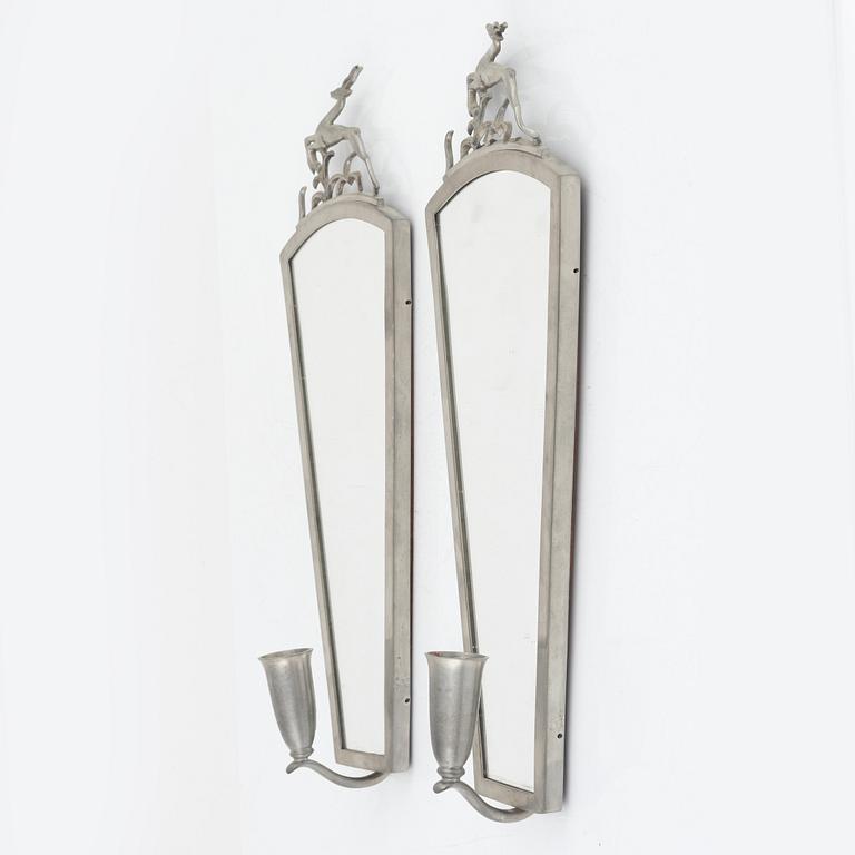 A pair of Swedish Grace wall sconces, mark of CG Hallberg, Stockholm 1931.