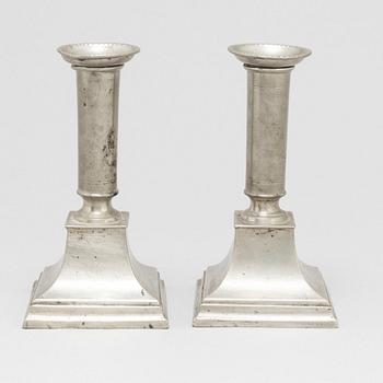 A pair of Swedish late gustavian pewter candlesticks by Gottlob Friedrich Baumann.