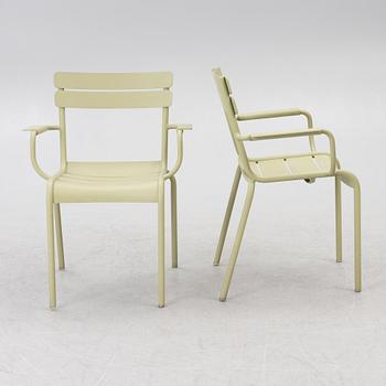 Frédéric Sofia, a table and two chairs for outdoor use, "Luxembourg" Fermob, France, 21st century.