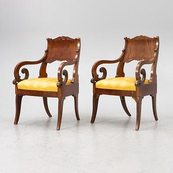 A pair of Russian/Baltic Empire mahogany armchairs, 1830's/40's.