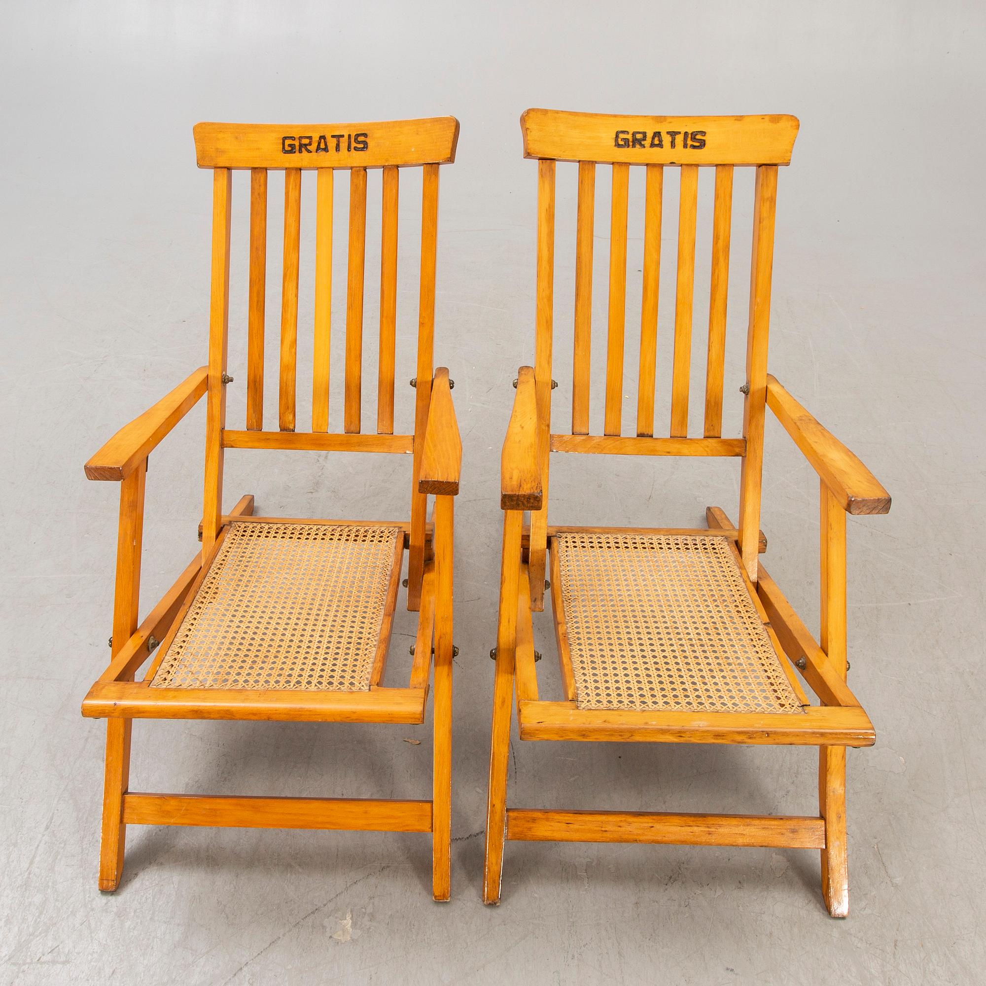 A pair of early 1900s deck chairs.