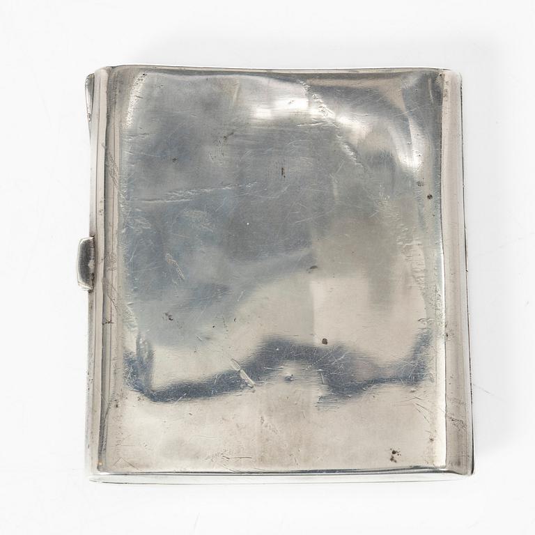 Cigarette case, silver, with a motif of Anders Zorn's "Flickan på loftet" from 1905 in enamel.