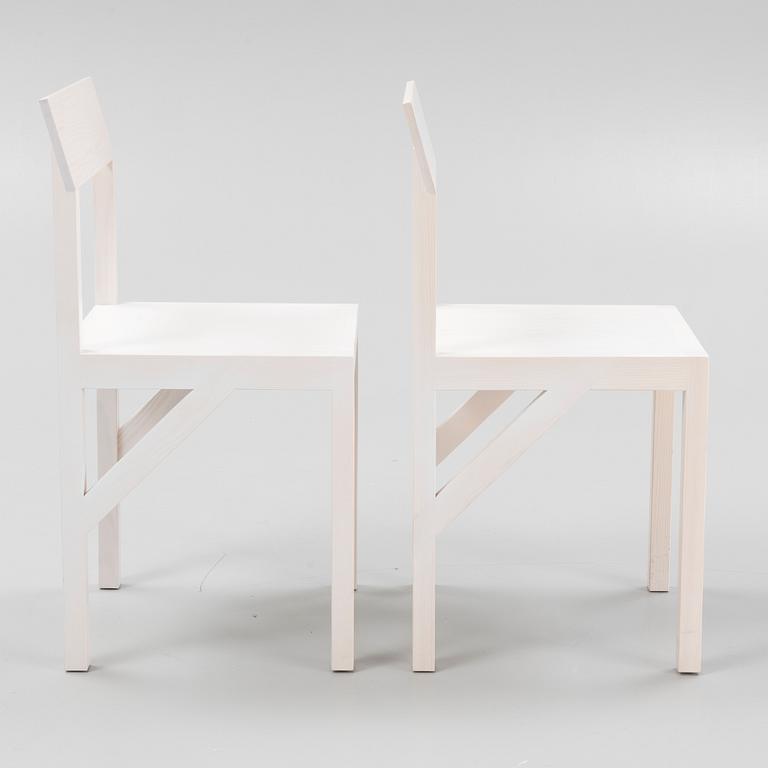 A pair of signed white stained pine 'Bracket Chairs' by Frederik Gustav for Frama, Copenhagen 2023.