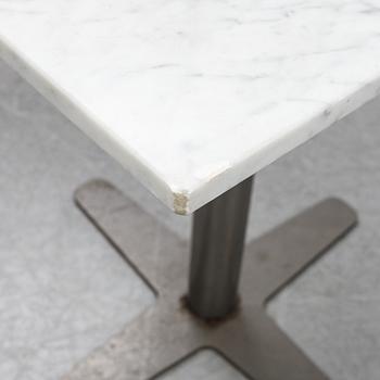 A marble top table, 21th century.