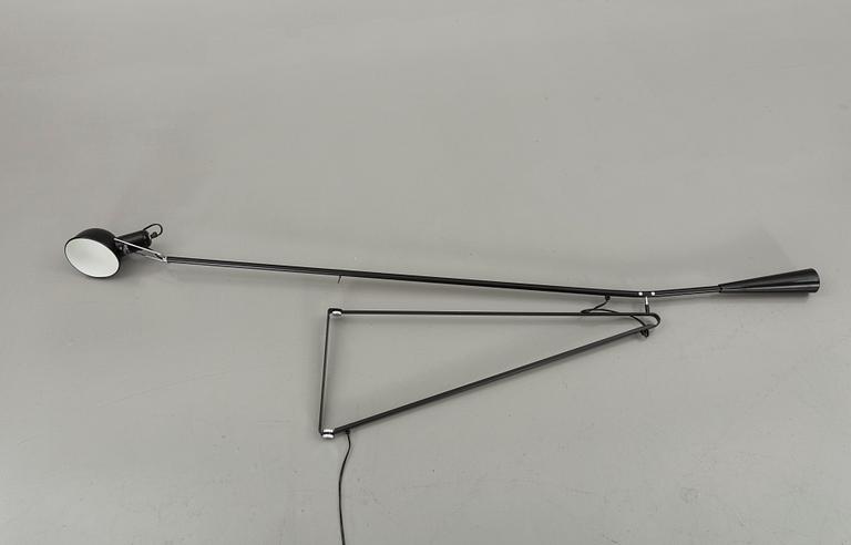 A FLOS WALL LAMP, MODEL 265. Designed by Paolo Rizzatto.