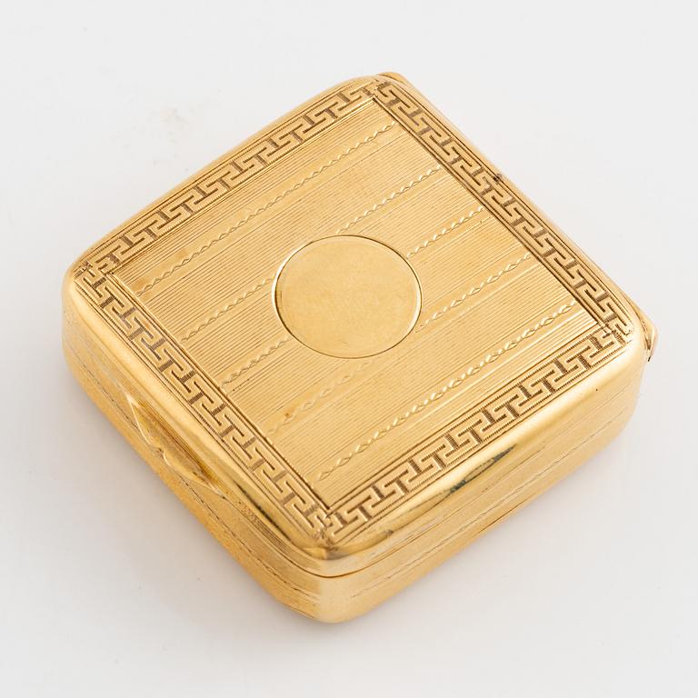 18K gold box.