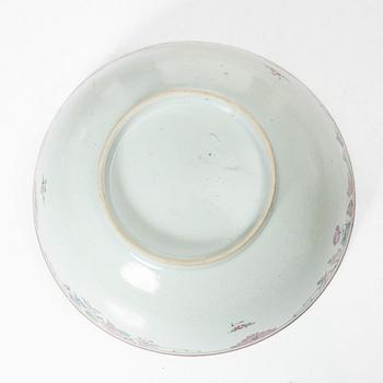Two famille rose plates and a bowl, Qing dynasty, 18th century.