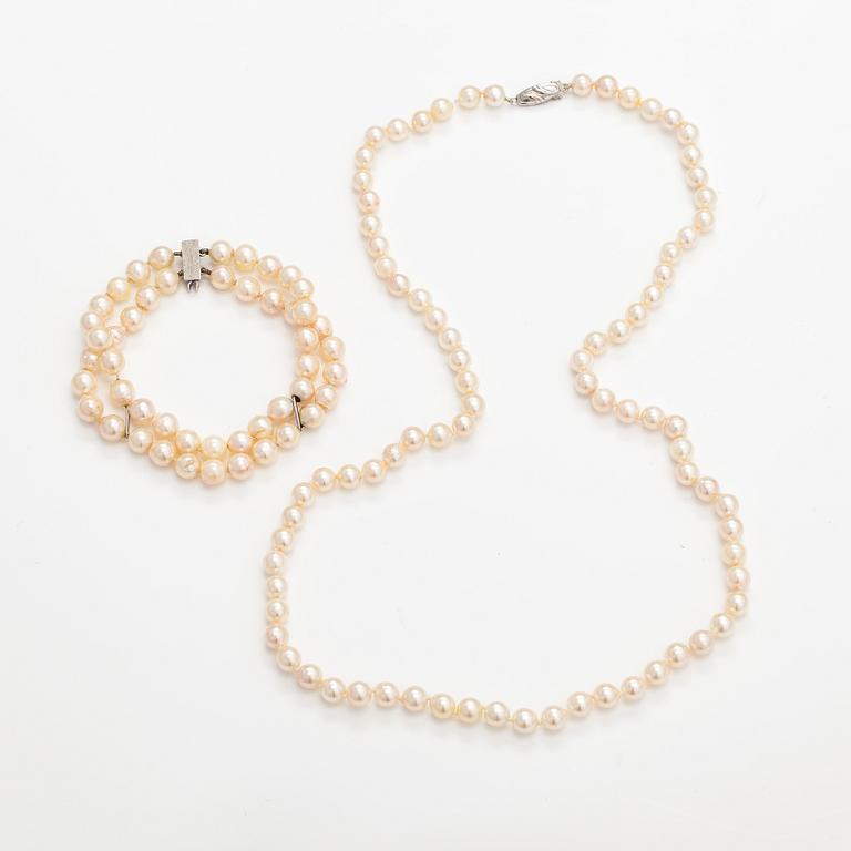 A pearl collier and two-strand pearl bracelet with cultured pearls and sterling silver.