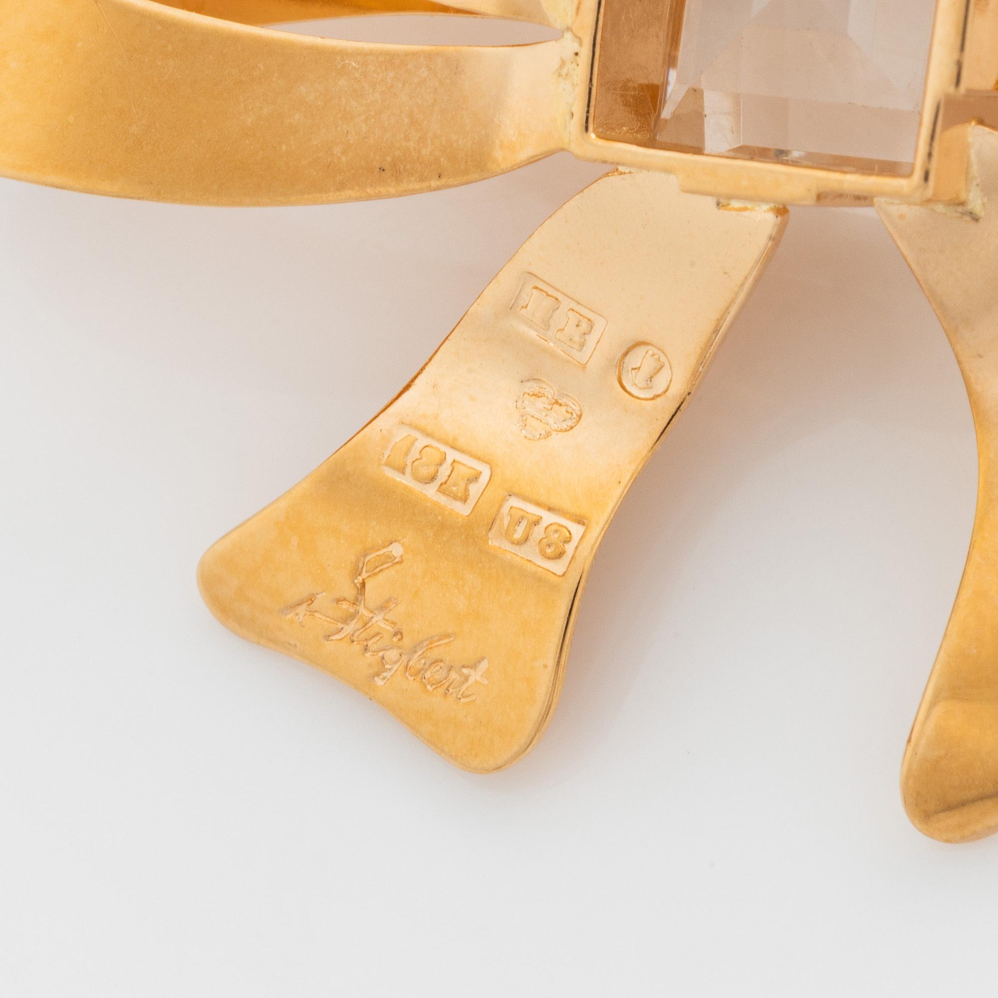Stigbert, brosch 18K guld med bergkristall.