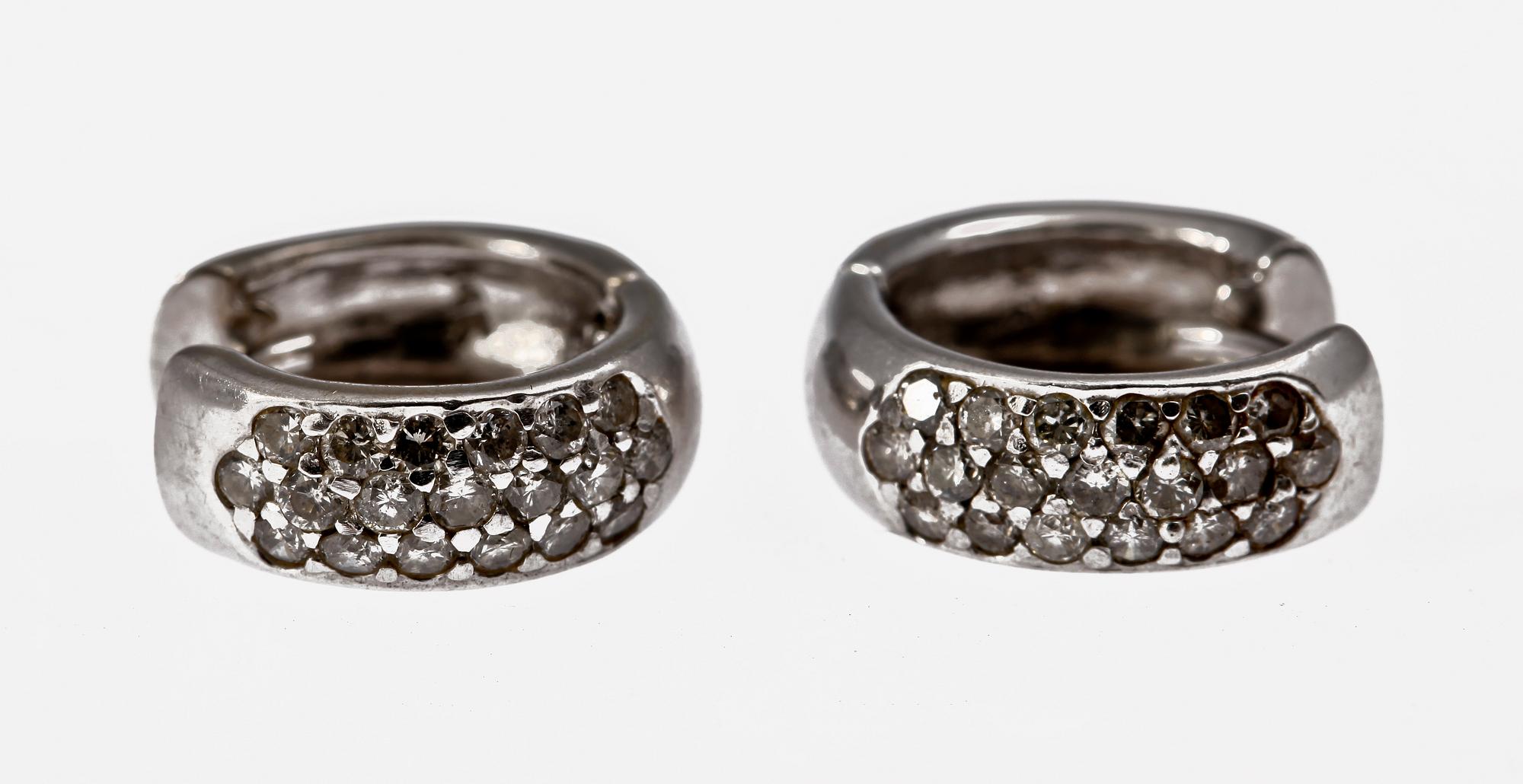 EARRINGS, 14 K white gold with brilliant cut diamonds, tot 1.14 ct.