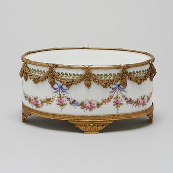 A porcelain bowl with a mark similar to Sèvres, around the year 1900.