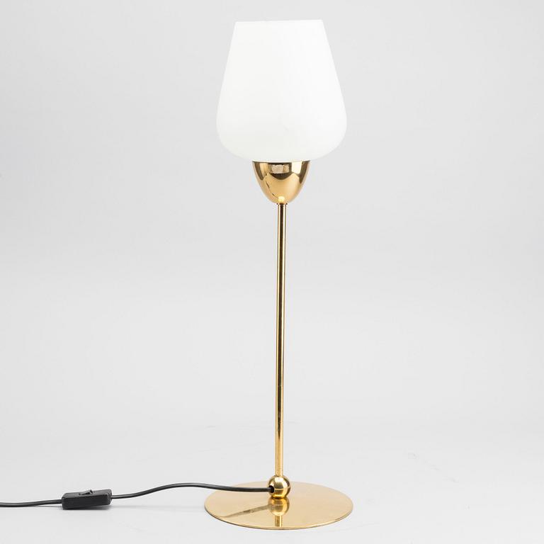 A LUMESS TABLE LAMP MADE IN SWITZERLAND.