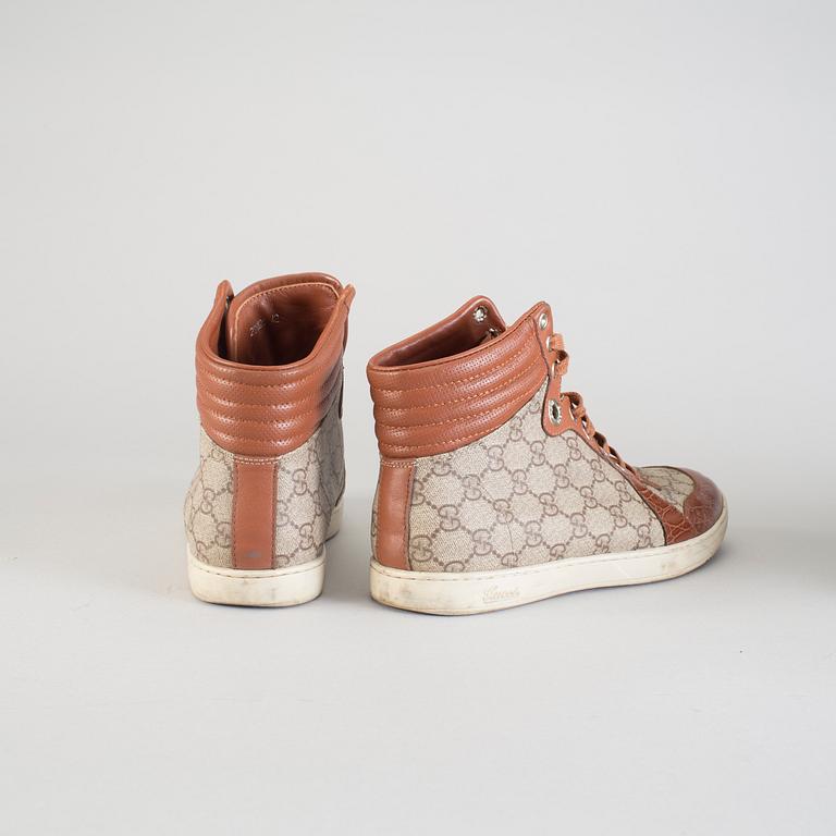 A pair of hight-top Gucci sneakers, european size 42.