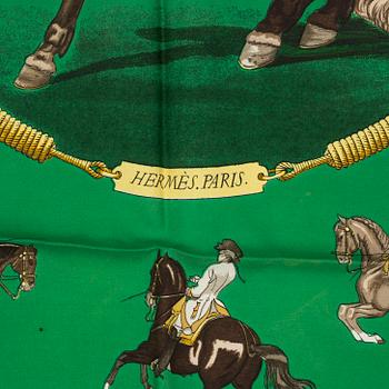 A silk scarf "les Figures d'Equitation" by Hermès.