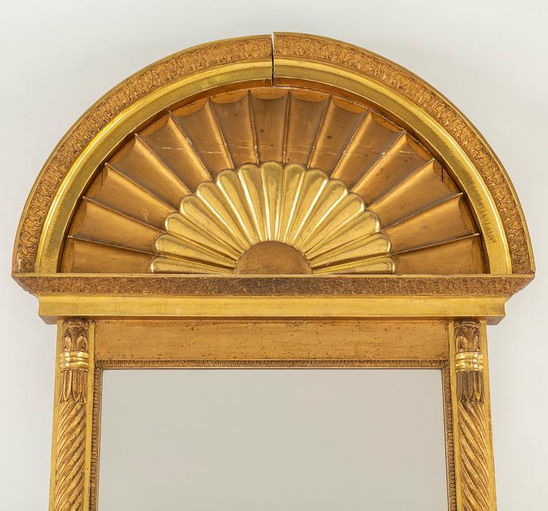 An Empire mirror from the first half of the 19th century.